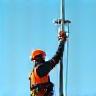 Technician installing 5G antenna