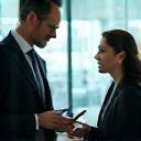 Consultants discussing mobile strategy