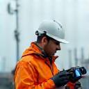 Technician testing network signals